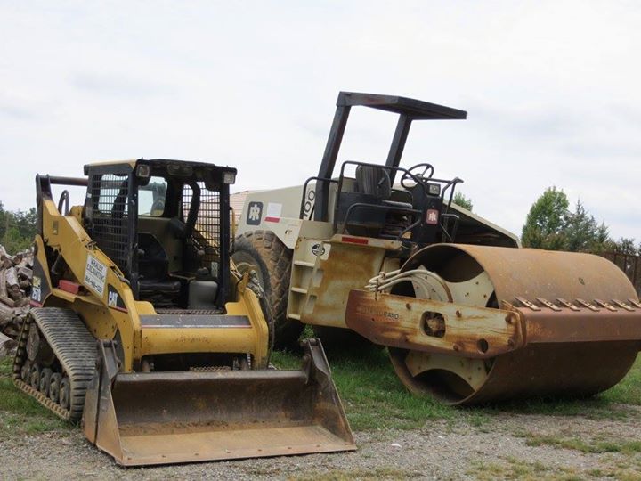Cat bulldozer and steamroller
